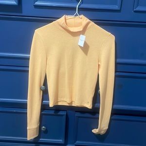 American eagle orange turtle neck. Size small